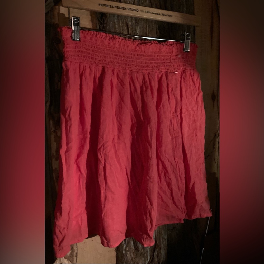 Pink skirt.